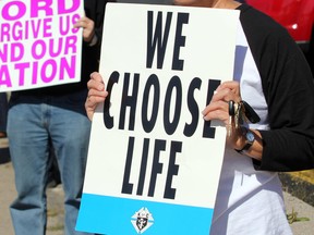 Anti-abortion protesters take part in Life Chain in this file photo.