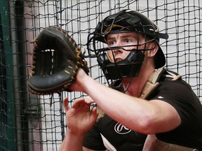 Catcher Justin Dineen, of the Laurentian University baseball team, takes part in a training session at the Baseball Academy in Sudbury, Ont. on Tuesday September 4, 2018. John Lappa/Sudbury Star/Postmedia Network