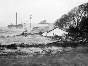 High tides, whipped in by Hurricane Hazel, shatter boats and buildings in Swansboro, N.C., as the storm lashes the Atlantic seaboard in this Oct. 15, 1954, file photo. AP Photo, File
