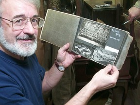 History professor Dieter Buse examines a private collection of photographs recording the rise of the Nazi party in Germany in the 1930s. Buse and Graeme Mount have spent the past few years researching and writing about northeastern Ontario’s military history, bringing the stories of this region’s past to life and releasing the first ever compilation of the region’s military history, Untold: Northeastern Ontario’s Military Past Volume 1, 1662-World War 1.
John Lappa / Postmedia