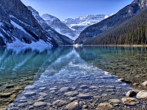 Lake Louise is stunning under pure blue sunny skies as the warm temperatures had people walking outside in t-shirts on Tuesday, October 16, 2018 photo by Pam Doyle/www.pamdoylephoto.com