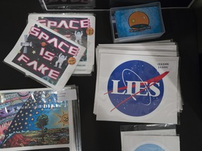 Stickers for sale at the Flat Earth International Conference this year in Edmonnton.