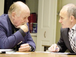 Sault College president Ron Common and Colin Kirkwood, vice-president academic, speak during a board of governors meeting in Sault Ste. Marie, Ont., on Thursday, Nov. 24, 2016. (BRIAN KELLY/THE SAULT STAR/POSTMEDIA NETWORK) ORG XMIT: POS1611241844553133