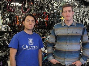 Carla Teixeira and Graeme Healey at Frontenac Cycle in Kingston in November. Teixeira authored the Bike Theft in Kingston report after surveying customers at Frontenac Cycle and on social media. (Steph Crosier/The Whig-Standard)