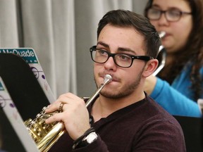 Members of the Laurentian Concert Band rehearse for a holiday concertina this file photo.