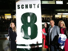 Former Sudbury Wolves player Rod Schutt and his wife, Rita, and daughters, Christen and Megan, take part in a pre-game ceremony at the Sudbury Community Arena in Sudbury, Ont. on Friday November 2, 2018. Schutt's number 8 was raised to the rafters.