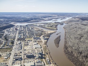 An aerial view of downtown Fort McMurray Alta. next to the Athabasca and Clearwater River on Thursday May 4, 2017. Robert Murray/Fort McMurray Today/Postmedia Network