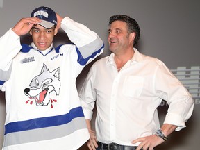 Dario Zulich, owner of the Sudbury Wolves, welcomes Quinton Byfield as the team's first overall pick in the OHL draft in April 2019.