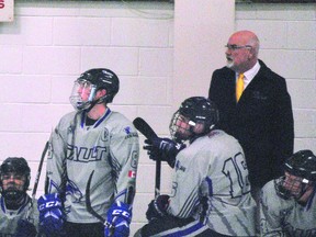 Veteran coach Mike Hall, behind the bench of the Sault College Cougars, in American Collegiate Hockey Association action from earlier this season.