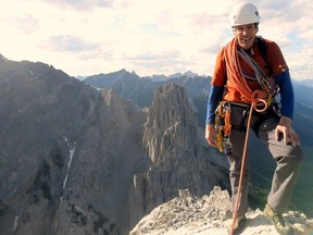 Tim Auger at the summit of Banff's Mount Louis, one of his favourite challenges. This photo was taken after the last time he climbed it. He climbed the route via homage to the Spider, which he first did in 1988. Photo credit Brandon Pullan.