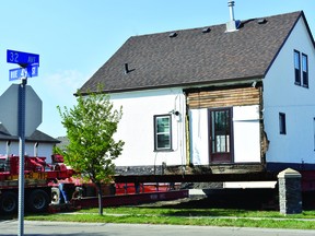 Emily Jansen/La Nouvelle Beaumont News
The historic St. Jacques house was moved to its new home on Sept. 14, 2018 after seven years of planning by the Beaumont Historical Society.