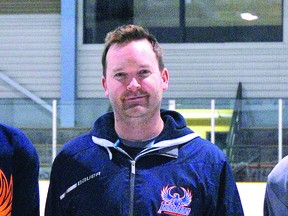 Jr. Greyhounds head coach Jamie Henderson (centre.)