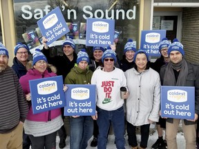 Safe 'n Sound volunteers, staff and participants of the 2019 Coldest Night of the Year walk, stand outside the Safe 'n Sound drop-in centre in Owen Sound. From the left are, Terry Jones, Paul Witendorf, Bonnie Field, Dr. George Saab, Amanda Leslie, Alicia Yule, Paul Fraser, Conner Jones, Donna Prii-Corbiere, Jamie Carlisle, Frank Sylvest, Patty Bell and Lynn Paylor. (Scott Dunn/The Owen Sound Sun Times/Postmedia Network)