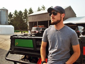 Dylan Sher, producer on the film Before the Plate, speaks with media on the Craven farm near Chatham Aug. 15, 2018. The farm was featured in the documentary.