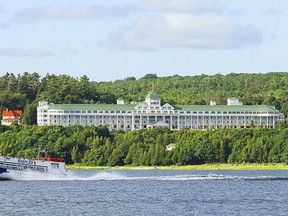 A tour boat speeds past the Grand Hotel on Mackinac Island, Mich., in this file photograph from 2008. (Karen Bleier/AFP/Getty Images)