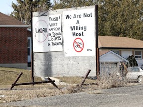 A sign on a property gives the stance of locals for the proposed dump in Ingersoll, Ont. on Wednesday March 27, 2019. The community liaison committee met for the 35th time Wednesday with about 100 people protesting outside Walker Environmental's building. (Greg Colgan/Woodstock Sentinel-Review)