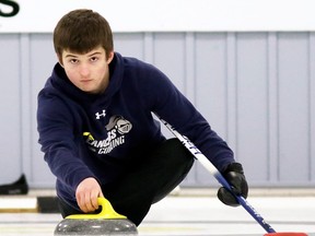 Ursuline Lancers skip Alex Jeromel throws a rock during the SWOSSAA boys' curling final against the St. Patrick's Fighting Irish at the Golden Acres Curling Club in Blenheim, Ont., on Monday, March 4, 2019. Mark Malone/Chatham Daily News/Postmedia Network