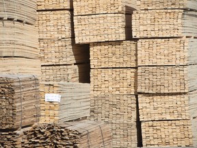 Stacks of lumber (The Canadian Press File Photo)