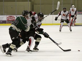 Minor Hockey across the province has been cancelled for the season. Here a member of the PAC Saints battles two Knights of Columbus Centennials during a Alberta Minor Midget Hockey League game in Stony Plain on March 2, 2020. The Saints won 3-0.  Photo by Evan J. Pretzer Reporter/Examiner