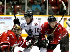 The Owen Sound Attack are set to play the Guelph Storm 12 times next season with a schedule heavily weighted for in-division contests. 

Trent Bourque (No. 17) drives Mackenzie Entwistle by the net while Attack goaltender Andrew MacLean readies himself for a shot in the second period as the Owen Sound Attack host the Guelph Storm on March 19, 2019 at the Harry Lumley Bayshore Community Centre. Greg Cowan/The Sun Times
