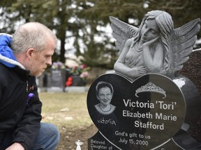 Rodney Stafford, father to Tori Stafford, at her grave shortly before the 10th anniversary of her death. Stafford is organizing a Parliament Hill rally to fight for justice reform, inspired by his daughter. (KATHLEEN SAYLORS, Sentinel-Review)