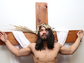 Cedrick Sumabat portrays Jesus in L'Arche Sudbury's dramatization of the Way of the Cross at a presentation at Christ the King Church in Sudbury, Ont. on Friday April 19, 2019, at 6:30 p.m. This contemporary adaptation represents the path Jesus bore on his way to the crucifixion. John Lappa/Sudbury Star/Postmedia Network