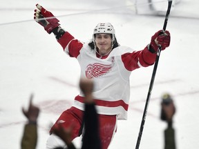 Detroit Red Wings left wing Tyler Bertuzzi celebrates his overtime goal against the Buffalo Sabres in an NHL hockey game in Buffalo, N.Y., Thursday, March 28, 2019. Detroit won 5-4.