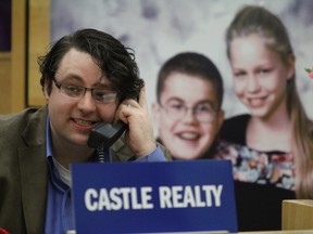 A volunteer takes a call during the Easter Seals telethon at Civic Centre in Sault Ste. Marie, Ont., on Sunday, March 30, 2014. (BRIAN KELLY/THE SAULT STAR/POSTMEDIA AGENCY)