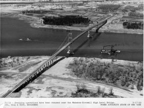 Handout/Cornwall Standard-Freeholder/Postmedia Network
This New York Power Authority photo shows a dredger deepening the channel under the south span of the Seaway International Bridge between Cornwall Island and Massena, N.Y., prior to the opening of the St. Lawrence Seaway in 1959.