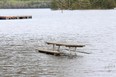 In this file photo, a picnic table is partially submerged on the grounds of 5 Fish Resort off of Whip-Poor-Will Road in the Municipality of French River.