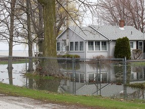 This file photo shows the impact after winds blew waves from Rondeau Bay onto this property in Erieau, Ont. Ellwood Shreve/Chatham Daily News/Postmedia Network