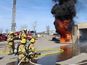 Firefighters from the Stony Plain Fire Department conduct a demonstration during an event to mark emergency preparedness in 2019. The Town recently announced that it is looking to clarify the position of elected officials who serve at the department with an upcoming bylaw.