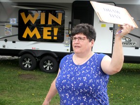 Brenda Clarke, lead agency project manager, sells tickets to Algoma Family Services' Great Escape Dream Draw outside the agency's office on McNabb Street in Sault Ste. Marie, Ont., on Saturday, May 26, 2018. (BRIAN KELLY/THE SAULT STAR/POSTMEDIA NETWORK)