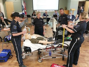 Frontenac Paramedics demonstrate how they treat a patient for Frontenac County councillors in 2017. The provincial government committed $6.5 million to support Frontenac's paramedicine program.