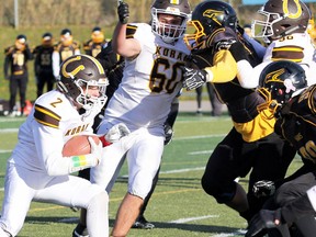 PETER RUICCI/Sault Star
Korah's Tyler Brechin runs inside for yardage against Sudbury's Lively Hawks in the 2018 NOSSA senior football semifinal. The Colts stopped the Hawks 52-23 and went on to win the NOSSA title.