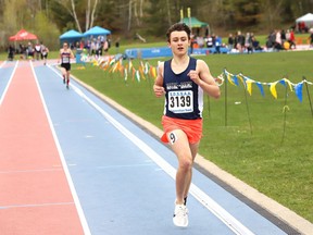 Andre Larocque, of College Notre-Dame,  competes in the boys 3,000 metre event at the high school track and field championships at the track at Laurentian University in Sudbury, Ont. on Wednesday May 22, 2019.