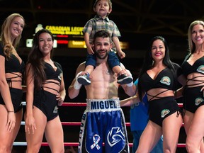 Tony Luis, centre, with his his son, after his bout on Friday June 21, 2019 in Cornwall, Ont. Robert Lefebvre/Special to the Cornwall Standard-Freeholder/Postmedia Network