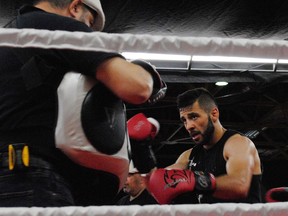 Jorge Luis trains his son, lightweight championship contender Tony Luis, during a public sparring session at Ed Lumley Arena, Saturday.

Greg Peerenboom/Cornwall Standard-Freeholder/Postmedia Network