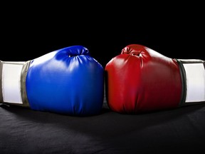 blue and red boxing gloves or martial arts gear on a black background depicting competition

Not Released