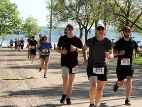 Participants in the half marathon of the Krista Johnson Memorial Run for Change set out from Riverside Park.