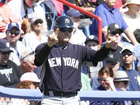 Third base coach Rob Thomson of  the New York Yankees in Dunedin, Fla., on Sunday, March 2, 2014. Veronica Henri/Toronto Sun/QMI Agency