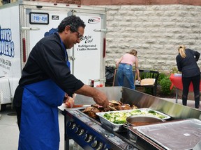 Cuban chef Carlos Mora cooks up a delicious meal for those in attendance at the 2019 Multicultural Festival in Stratford. Galen Simmons/Beacon Herald file photo