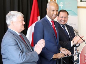 The Honourable Ahmed Hussen, then Minister of Immigration, Refugees and Citizenship, announces in June Sault Ste. Marie is a site for the Rural and Northern Immigration Pilot. At city hall, he stands alongside Terry Sheehan, Member of Parliament for Sault Ste. Marie (left), and Mayor Christian Provenzano, as the trio celebrates this step towards further economic growth. MAGGIE KIRK