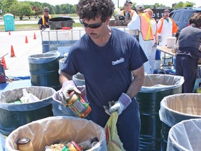 In this file photo, items are sorted during a previous Lambton County Household Hazardous Waste Day.
