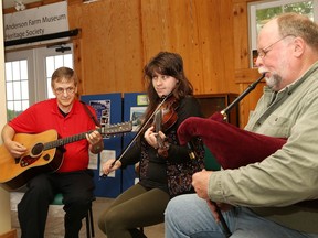 Pat McGuire, left, Karly Schofield and Peter Richards, of The Wild Geese, perform at the launch of the Anderson Farm Museum Heritage Society's annual Rock the Farm concert and farmers' market summer series at Anderson Farm Museum in Lively, Ont. on Thursday June 13, 2019. Rock the Farm, however, has been cancelled for 2022.