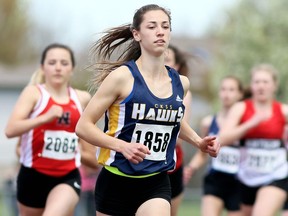 Emma Pegg of Chatham-Kent leads the junior girls' 1,500 metres on Day 1 of the LKSSAA track and field championship at the Chatham-Kent Community Athletic Complex in Chatham, Ont., on Tuesday, May 14, 2019. Mark Malone/Chatham Daily News/Postmedia Network