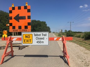 A road closure sign at the corner of Coatsworth Road and Talbot Trail. (File Photo)