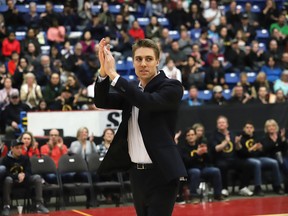 Sudbury Five head coach and general manager Logan Stutz applauds during a pre-game awards ceremony where Braylon Rayson was recognized as National Basketball League of Canada MVP, Jaylen Bland as NBLC Newcomer of the Year and Stutz as executive of the year in Sudbury, Ont. on Wednesday April 10, 2019.