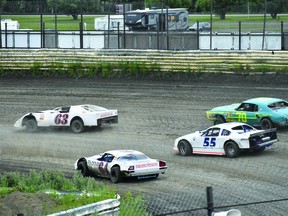 Thunder road
Racing fans came out to the Castrol Raceway on Friday night, July 5 for the 2019 Dirt Oval Racing Nite Thunder drag racing event. Spectators cheered for their favourite cars as they roared around the dirt track to grab the win.
(Emily Jansen)