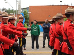 Members of the Wood Buffalo RCMP march during the Canada Day Parade in downtown Fort McMurray on Monday,, July 1, 2019. Vincent McDermott/Fort McMurray Today/Postmedia Network